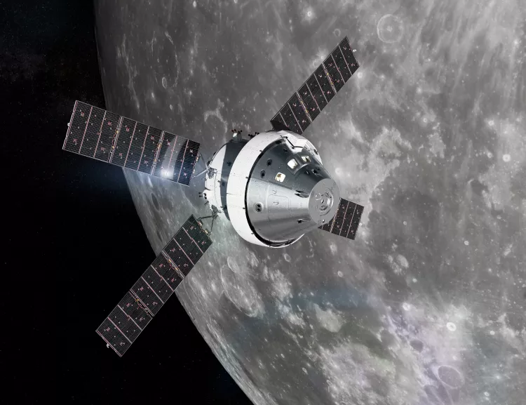 An illustration of NASA’s Orion Artemis I spacecraft orbiting the Moon. Credit Lockheed Martin